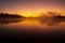 Sunrise mist over Mountainview Lake in Sunapee, New Hampshire