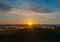 Sunrise misty field landscape at summertime