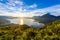 Sunrise in the morning at lake Atitlan, Guatemala - amazing panorama view to the volcanos San Pedro, Toliman and Atitlan