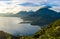 Sunrise in the morning at lake Atitlan, Guatemala - amazing panorama view to the volcanos San Pedro, Toliman and Atitlan