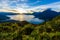 Sunrise in the morning at lake Atitlan, Guatemala - amazing panorama view to the volcanos San Pedro, Toliman and Atitlan