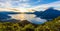 Sunrise in the morning at lake Atitlan, Guatemala - amazing panorama view to the volcanos San Pedro, Toliman and Atitlan