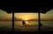 Sunrise and the morning light over the sea in unique movie perspective view from gazebo side.