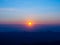 Sunrise in the morning is a red-orange circle on the horizon line. In the high view, we saw mountain silhouettes overlapping and