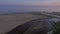 Sunrise on a northern baltic beach. 4K UHD.