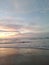 sunrise in oetune beach and clear cloudy skies