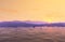 Sunrise over 3D Rendered Illustration Rocky Mountain Range and Calm Water