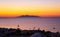 Sunrise over Aegean Sea seen from Kamari village Santorini Greece