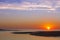 Sunrise over the beach and ocean at Corson\'s Inlet