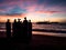 Sunrise over the beach in Philippines. Diving boats waiting for early morning divers.