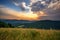 Sunrise over Beskydy mountains, wood and meadow. Hajdovy paseky