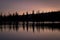 Sunrise over Central Oregon Lake. Sky color from wildfires nearby