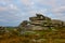 Sunrise over Cheesewring granite tor