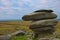 Sunrise over Cheesewring granite tor