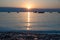 Sunrise over cloudy horizon, adriatic ocean croatia, swinging boats at the sea