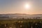 Sunrise over Dandelions and Countryside Fields with Dew Drops in