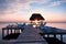 Sunrise over a dock in the Caribbean Sea