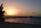Sunrise over dock Caye Caulker