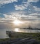 Sunrise over Dock Pier Seawall Jetty of Puerto Sunrise over Juarez in Cancun Bay Mexico