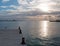 Sunrise over Dock Pier Seawall Jetty of Puerto Sunrise over Juarez in Cancun Bay Mexico