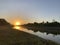 Sunrise over a drainage canal in Weston Florida