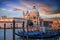 Sunrise over the famous gondolas of St. Mark`s Square in Venice, Italy