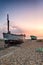 Sunrise over Fishing Boats on a Beach