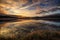 Sunrise over Hjerkinnsdammen lake, Dovre mountains. Dovrefjell-Sunndalsfjella national park, Norway