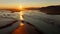 Sunrise over Icelandic Fjord During Low Tide Scenic Ocean Coastline WIth Black Sand