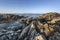 Sunrise over Irish rocky coastline