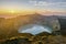 Sunrise over Kelimutu National Park with Tiwu Nuwa Muri Koo Fai and Tiwu Ata Polo