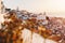 Sunrise Over Lisbon Old Town Alfama - Portugal. Lisbon Golden Hour Skyline. Balcony View on Alfama Old Town of Lisbon and Tagus