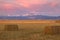 Sunrise over Longs Peak with Harvested crops in the foreground