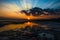 Sunrise over low tide sands at Bexhill in East Sussex, England