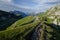 Sunrise over Mangart pass with Mangart road in foreground, Julian Alps, Triglav national park, Slovenia, Europe