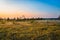 Sunrise over marshland in autumn coloured national park in Finland