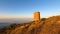 Sunrise over Mediterranean sea. Historic Torre Vigia De Cerro Gordo