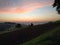 Sunrise over mountain farmland