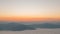 Sunrise over the mountain with fog in the morning, timelapse
