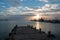 Sunrise over Puerto Juarez Cancun Mexico fishing boats / trawler and docks and pier and jetty and seawall