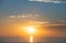 Sunrise over the sea and beautiful cloudscape. Colorful ocean beach sunset.