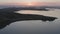 Sunrise over the Sea of Japan. Calm sea in calm, shining reflections