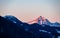 Sunrise over snow capped mountain peaks of Karawanks in Carinthia, Austria. Julian Alps. Scenic view on Wertatscha and winter