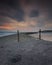 Sunrise over the South Pier and entrance to Cullercoats Bay on the North East Coast of England.