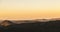 Sunrise over the trees and mountains of Lassen volcanic national