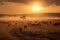 Sunrise over a Vast Savannah with a Herd of Wildebeests