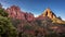 Sunrise over The Watchman Peak and Bridge Mountain and Red Sandstone Cliffs in Zion National Park in Utah, USA