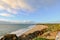 Sunrise over the water from the Lambert`s Beach lookout, Mackay Queensland Australia