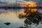 Sunrise over waterfront and boats