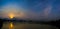 Sunrise Panaroma of lake, the town and Mountain.